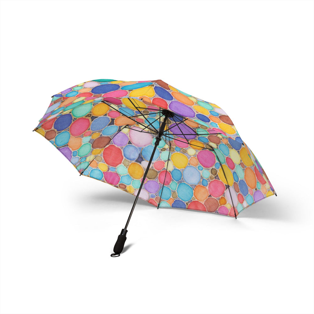 Colorful umbrella with a pattern of multicolored circles on a white background