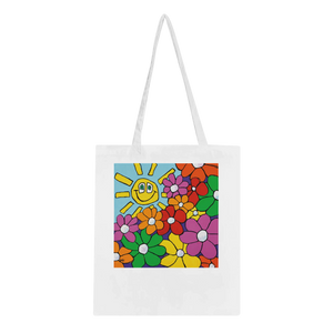 A high-quality white canvas tote bag featuring "Bouquet & Sun," a vibrant original artwork by MFPA mouth painter Lars Hollerer, depicting a cheerful smiling sun and a colorful garden of flowers.