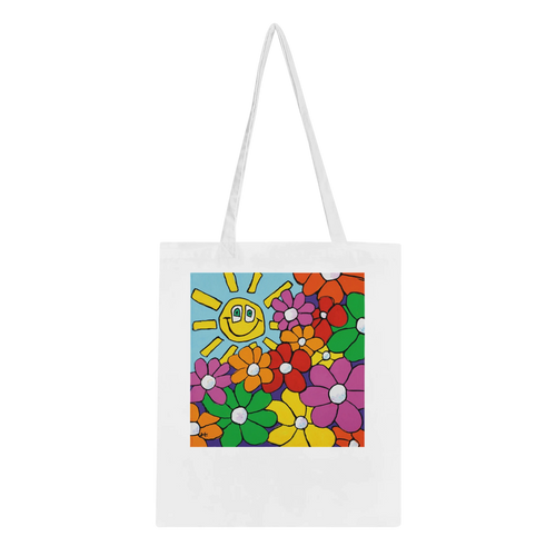 A high-quality white canvas tote bag featuring "Bouquet & Sun," a vibrant original artwork by MFPA mouth painter Lars Hollerer, depicting a cheerful smiling sun and a colorful garden of flowers.